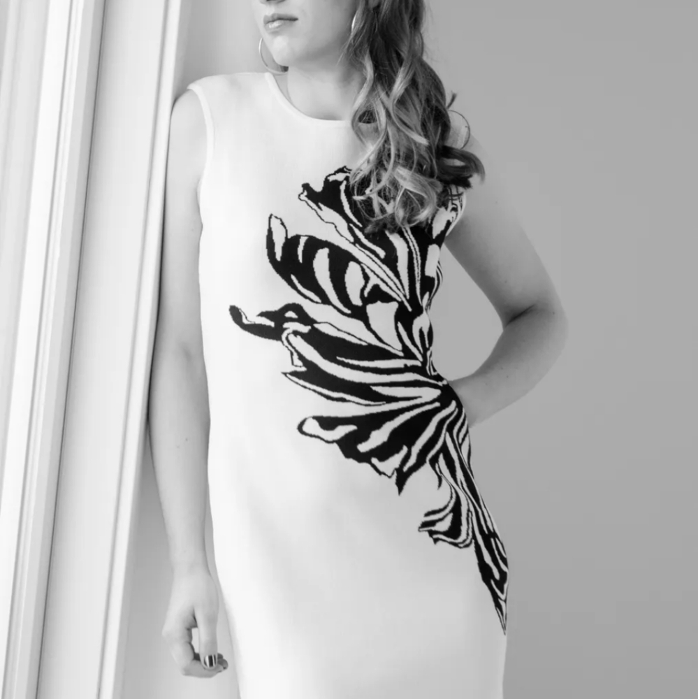 NWT Calvin Klein white knit bodycon dress with black floral detail. Sleeveless
